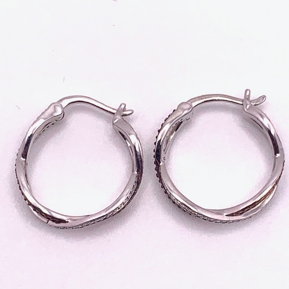 Rhodium two-tone swirl hoop earrings 1/8 tcw - Picture 3 of 7